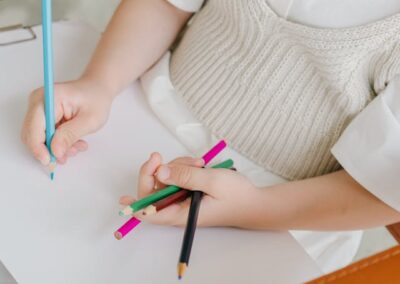 A Young Girl drawing on the Paper